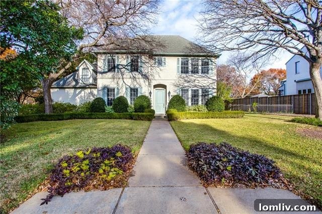 Bluffview Wonders: Save The Date 15 Elegant French-inspired traditional home exterior on a corner lot