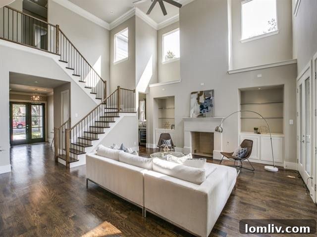 Bluffview Wonders: Save The Date 9 Grand entrance with sweeping staircase and high ceilings