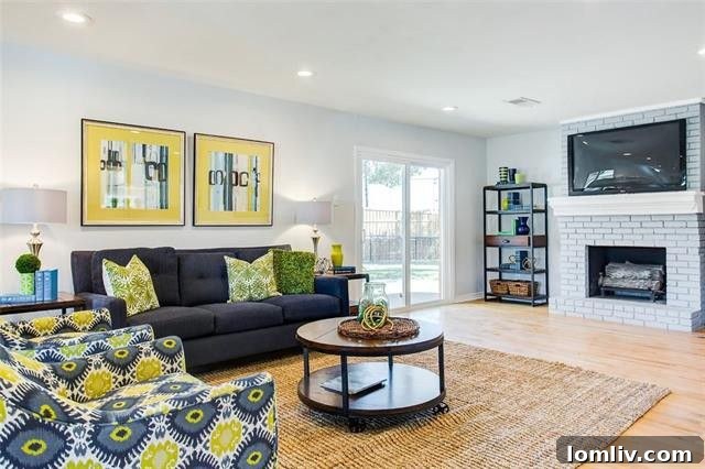 Cozy Second Living Area with Painted Brick Fireplace