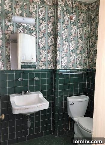 Southern Dallas Opportunities: Lawnview Station, Trinity Forest's Edge 13 Bathroom with original tile and wallpaper at 7625 Blossom Lane