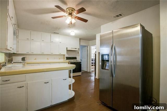 Southern Dallas Opportunities: Lawnview Station, Trinity Forest's Edge 7 Eat-in kitchen with original cabinets at 2310 Waycross Drive