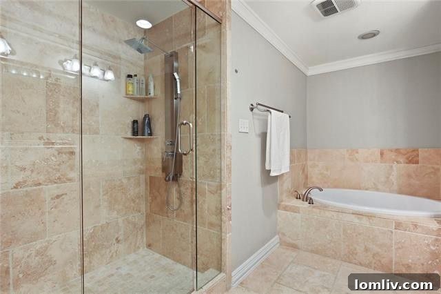 Modern gourmet kitchen with granite countertops and stainless steel appliances in 9638 Broken Bow Rd