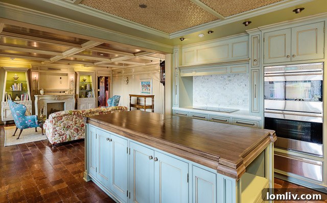 Another view of the custom kitchen, highlighting high-end appliances