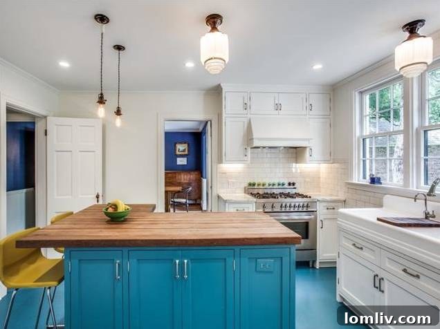 High-end Bertazzoni range, integrated Liebherr refrigerator, and custom cabinetry in the gourmet kitchen