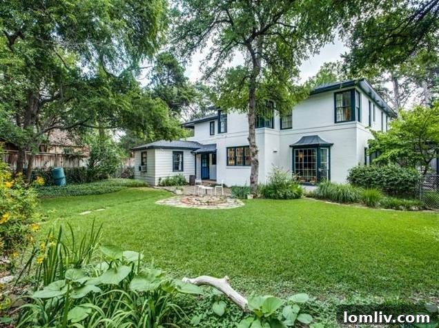 Lush backyard and inviting outdoor living space of the Kessler Park home, ideal for relaxation and entertaining