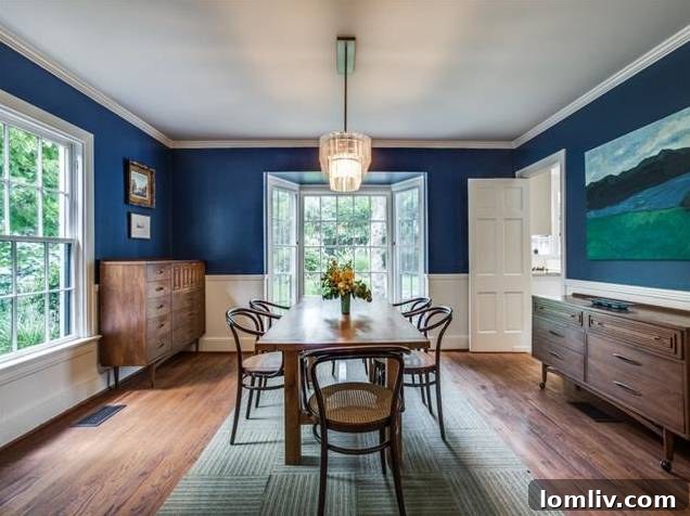 Charming screened porch, perfect for year-round outdoor entertaining at 1321 Canterbury Ct.
