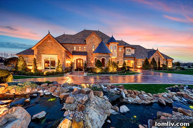Grand exterior of a sprawling luxury mansion on a two-acre estate in Fort Worth, Texas.