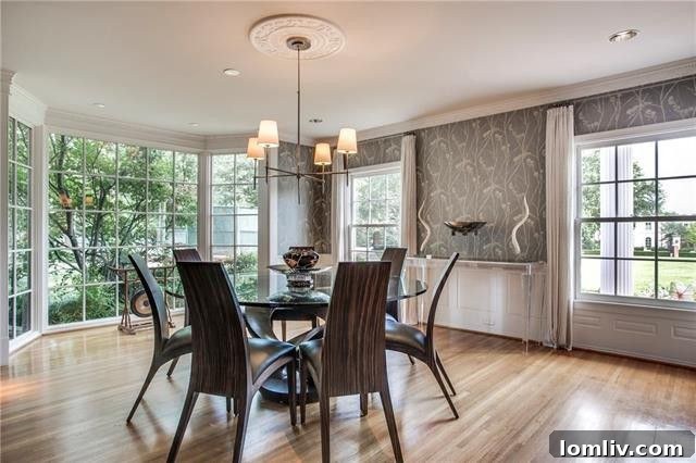 Expansive and bright dining room with breathtaking views of the estate grounds