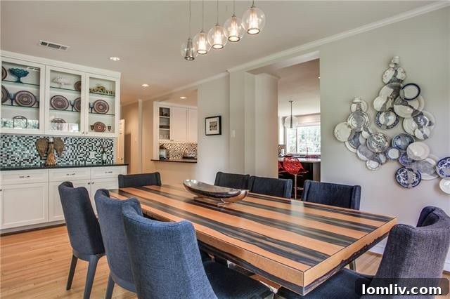 Breakfast area adjacent to kitchen and formal dining room