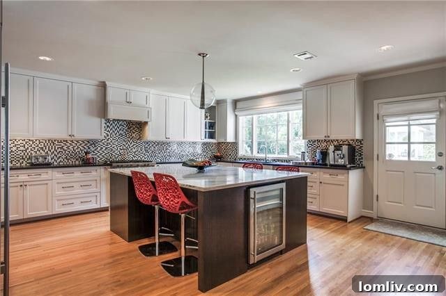 Luxury eat-in kitchen with premium Miele, Wolf, and Subzero appliances