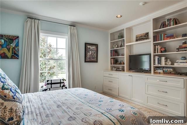 Fourth bedroom with custom built-ins and a private en-suite bathroom