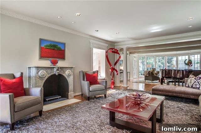 Spacious formal living room connecting to round entertainment room