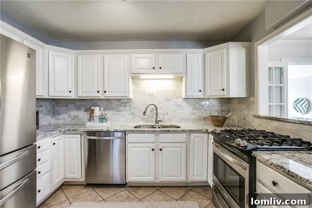 Modern Kitchen with Granite Counters and Marble Backsplash