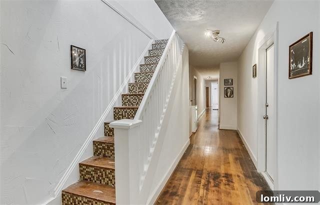 Elegant entrance to the 1935 multi-family property in Junius Heights