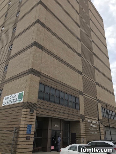 Interior rendering of a potential welcoming space in the transformed Dawson State Jail, showing comfortable furnishings and warm lighting
