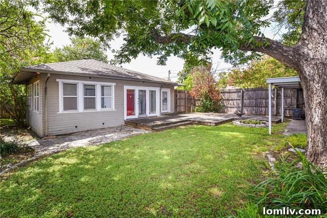 Spacious Backyard with Deck and Covered Parking