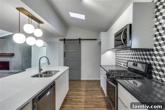 Open Concept Living Area with Cement Fireplace