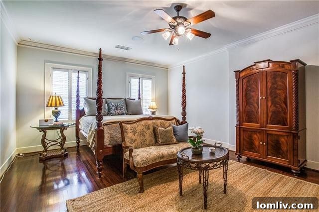 The primary bedroom, offering comfort and timeless elegance.