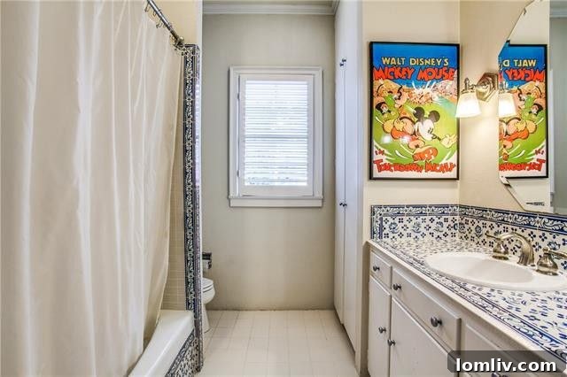 Another elegant bathroom, featuring high-end finishes.