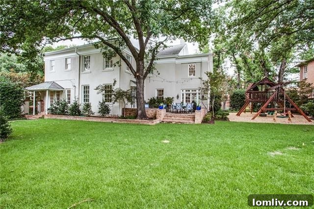 Lush backyard view, offering privacy and serene green space.