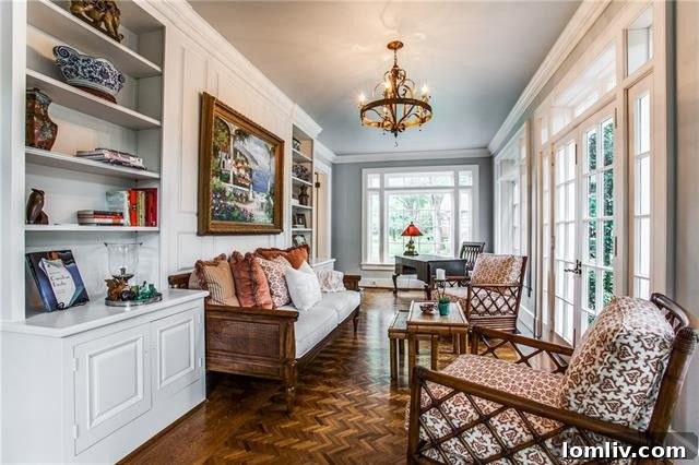 Another perspective of the bright and welcoming sunroom.