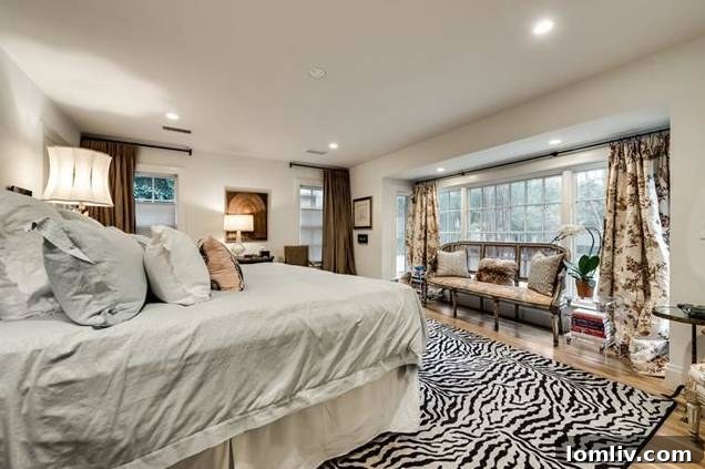 Gourmet kitchen with stainless steel appliances and stone countertops