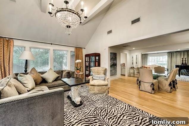Interior view of the sunroom with vaulted ceilings and large windows