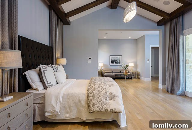 First-floor master suite with vaulted ceiling and private patio