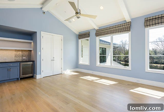Game room with mini-refrigerator for entertainment