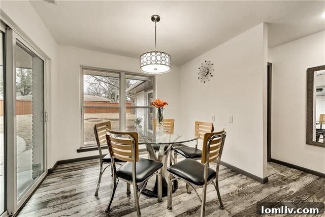 Three Stunning Dallas Open Houses 15 Contemporary kitchen with farm sink and gray Shaker-style cabinets at 1535 Acapulco Dr