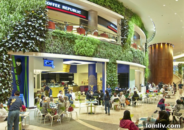 Stunning green wall installation inside Kuwait’s 360 Mall featuring a rich variety of plants.