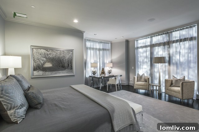 Vendome 1H Master Corridor - Art and window lined hallway