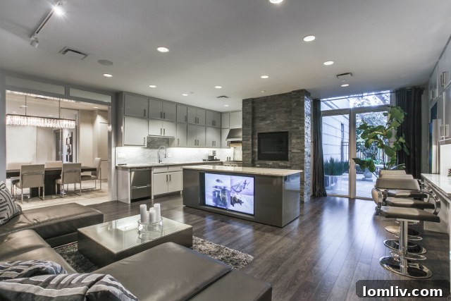 Vendome 1H Kitchen View - Modern kitchen with island and fireplace