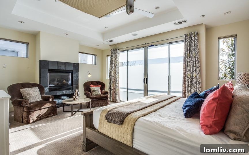 Spacious Master Bedroom with Built-ins and Tray Ceilings