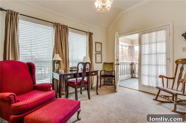Comfortable and well-appointed sitting area within the luxurious master suite of this Las Colinas home