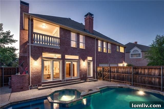 Stunning backyard swimming pool and spacious patio, ideal for relaxation and outdoor entertaining