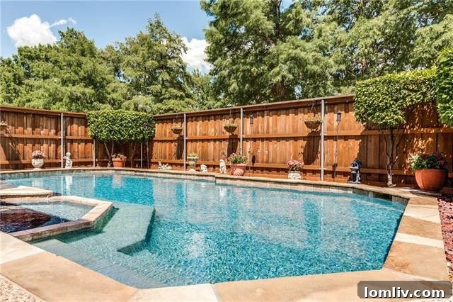 Elegant brick exterior and meticulously landscaped front garden of 600 Ginkgo Circle in Irving, TX