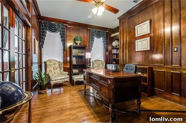 Cozy fireplace feature in the elegant formal den, perfect for intimate gatherings