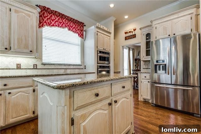 State-of-the-art gourmet chef's kitchen featuring stainless steel appliances and granite countertops