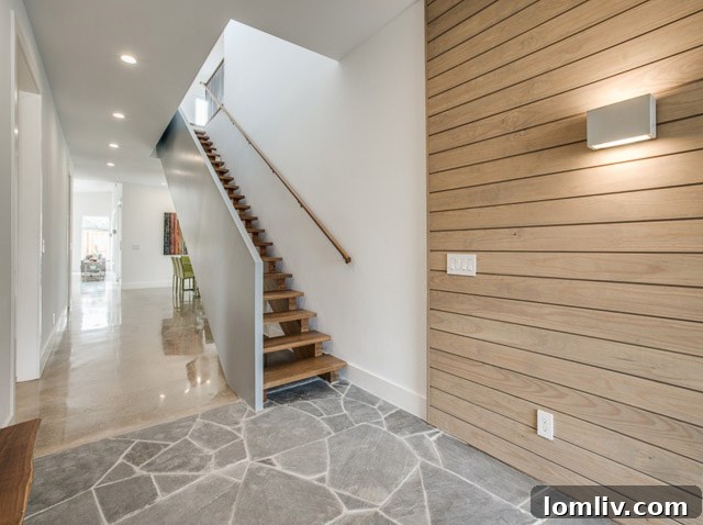 Bedroom with large windows showcasing natural light in the Passive House