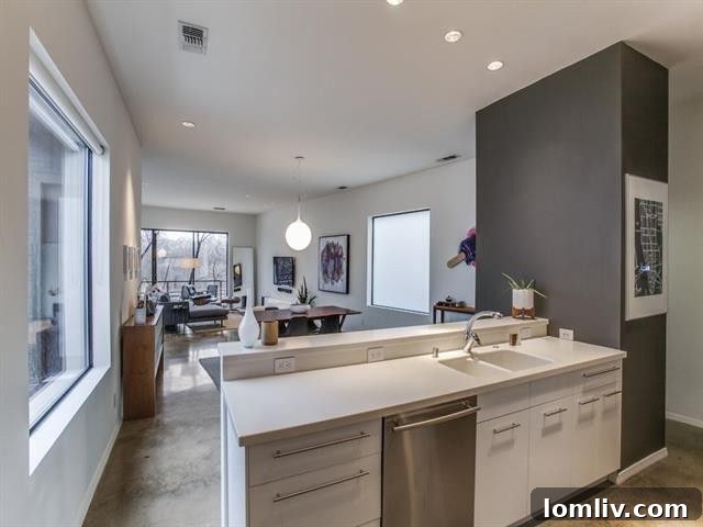 Interior view of the open-plan living space with polished concrete floors