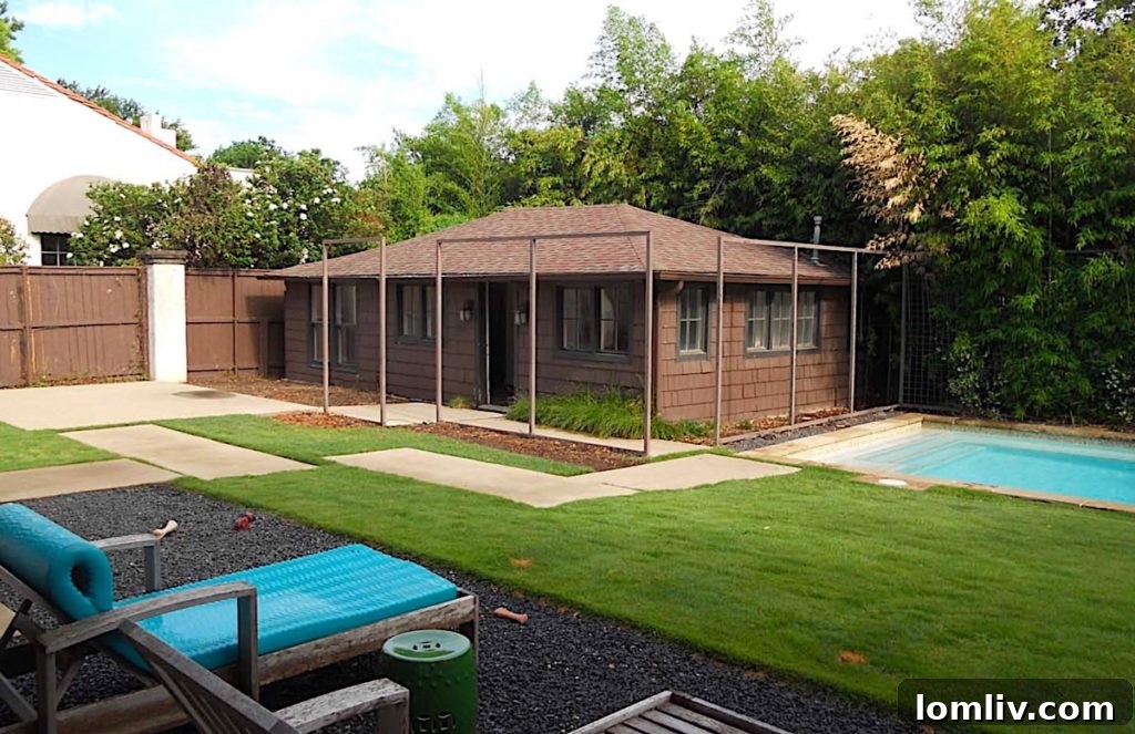 Before photo of the old pool house structure, showing its outdated condition