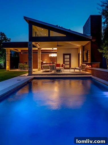 Final, stunning wide shot of the completed luxury pool house and perfectly designed backyard oasis
