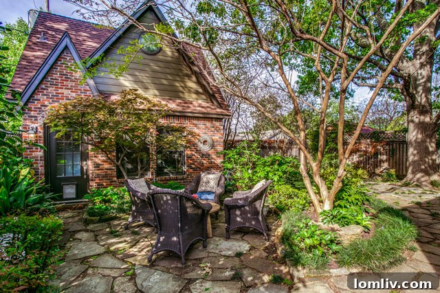 Hollywood Heights Tudor: A Designer's Vision Realized 28 The exterior of the charming English Tudor home at 707 Cordova Street, featuring classic architecture and curb appeal.