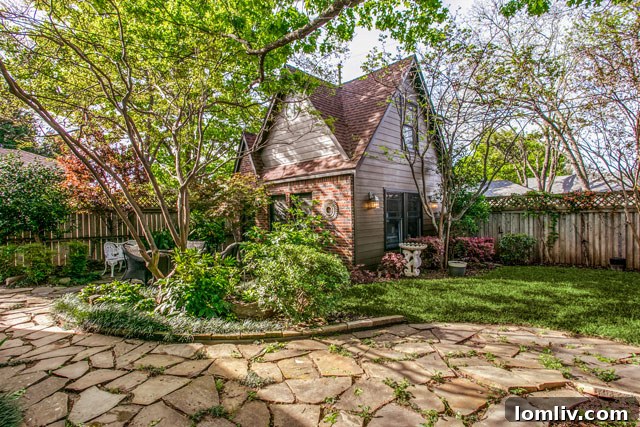 Hollywood Heights Tudor: A Designer's Vision Realized 30 Another angle of the home's exterior, showcasing the meticulous landscaping and traditional charm.