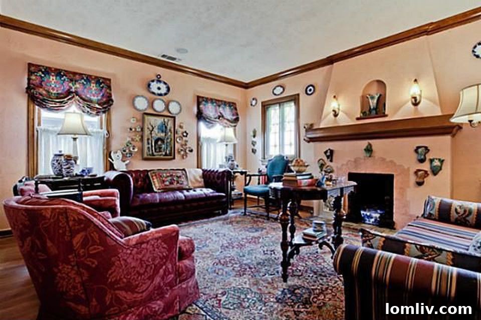 Hollywood Heights Tudor: A Designer's Vision Realized 5 Original living room of 707 Cordova Street before renovation, with older decor and less defined space.