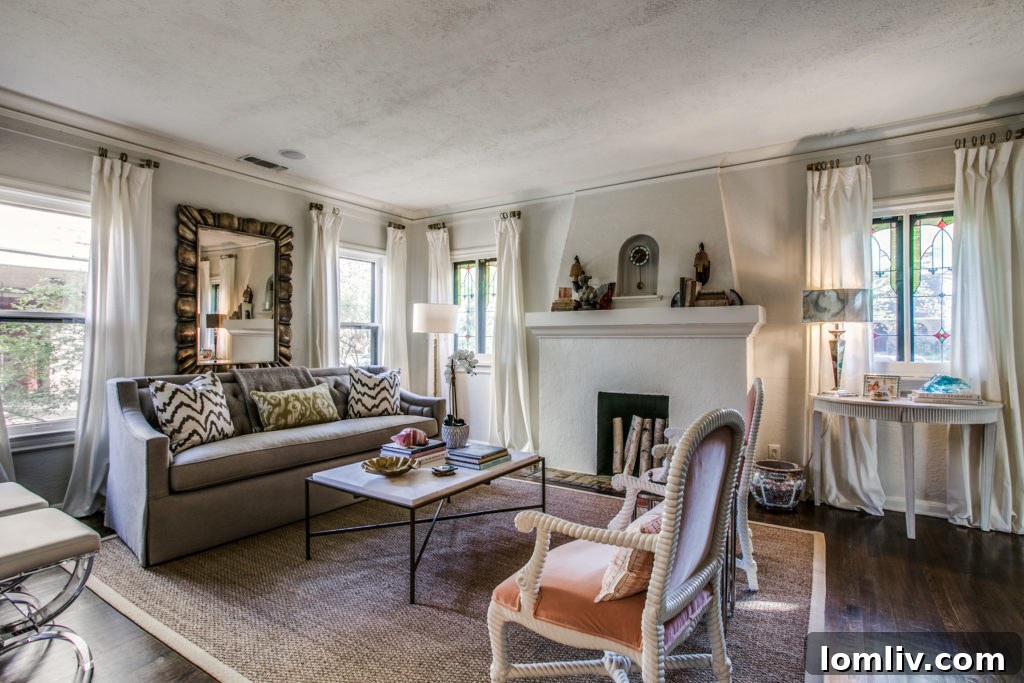 Hollywood Heights Tudor: A Designer's Vision Realized 6 After renovation, the living room of 707 Cordova Street featuring elegant design, improved lighting, and a cohesive aesthetic.