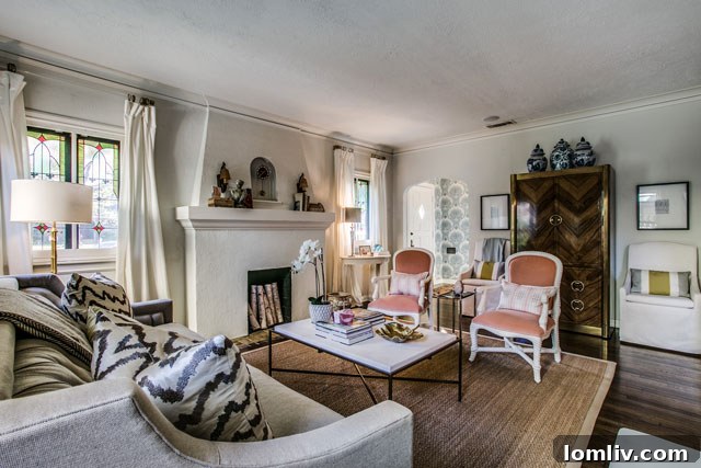 Hollywood Heights Tudor: A Designer's Vision Realized 7 Beautifully staged living room in the renovated 707 Cordova home, showcasing comfort and design.