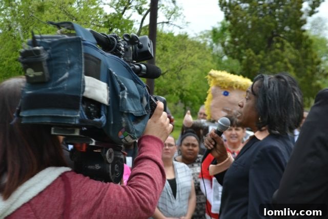 Dallas ISD trustee Joyce Foreman addresses protesters outside Billy Earl Dade Middle School Thursday afternoon