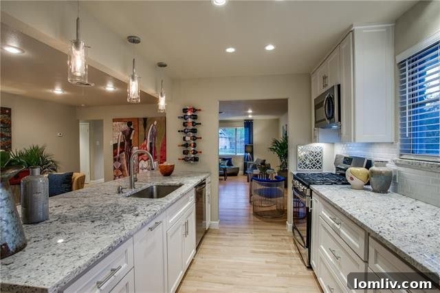 Updated kitchen with custom cabinets and granite counters in the 8521 Bretshire Dr property